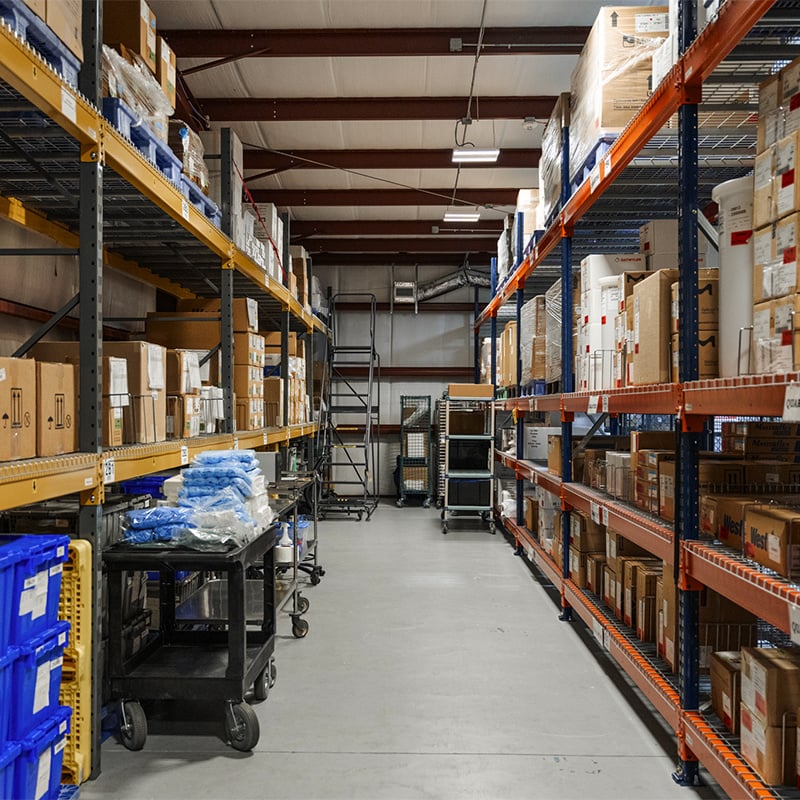 Row of shelves at packaging and warehouse site.