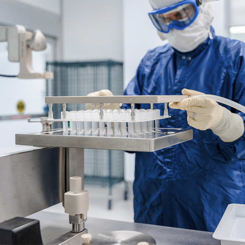 American Injectables employee working on formulation project. 